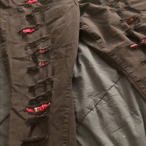 TORRID SKINNY DECONSTRUCTED JEANS